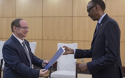 Israel's new Ambassador to Rwanda, Ron Adam, left, presents his credentials to Rwanda President Paul Kagame, on February 21, 2019. (Office of the President of Rwanda)