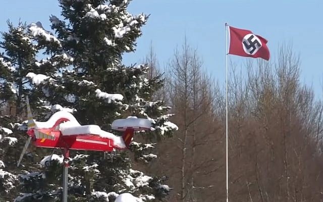 Screen capture of a swastika flag displayed on a pole in Charlottetown, Prince Edward Island, Canada, February 2019. (YouTube) Screen capture of a swastika flag displayed on a pole in Charlottetown, Prince Edward Island, Canada, February 2019. (YouTube)