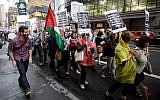 Illustrative: Palestinian and left-wing Jewish groups stage a rally walking from Times Square to the United Nations Building in New York, September 15, 2011, calling to end all US aid to Israel and support for the Boycott, Divestment and Sanctions (BDS) movement against Israel. (AP Photo/David Karp/File)