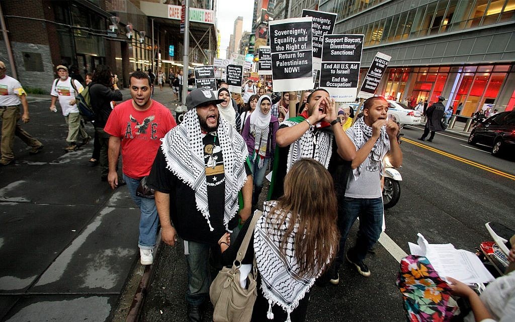 Illustrative: Palestinians and anti-Israel Jewish groups stage a rally walking from Times Square to the United Nations Building in New York, September 15, 2011, calling to end all US aid to Israel, end the occupation and support the Boycott, Divestment, Sanctions (BDS) movement against Israel. (AP Photo/David Karp) Illustrative: Palestinians and anti-Israel Jewish groups stage a rally walking from Times Square to the United Nations Building in New York, September 15, 2011, calling to end all US aid to Israel, end the occupation and support the Boycott, Divestment, Sanctions (BDS) movement against Israel. (AP Photo/David Karp)