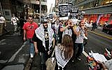 Illustrative: Palestinians and anti-Israel Jewish groups stage a rally walking from Times Square to the United Nations Building in New York, September 15, 2011, calling to end all US aid to Israel, end the occupation and support the Boycott, Divestment, Sanctions (BDS) movement against Israel. (AP Photo/David Karp)