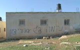 A home in the central West Bank Palestinian village of Beitillu, which was targeted in a price-tag attack on December 22, 2015. (Screen capture/Walla)
