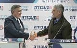 Labor chairman Avi Gabbay (L) welcoming former IDF Southern Command chief Tal Russo to the party, February 21, 2019. (Ra'anan Cohen)