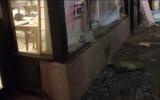 A large plate glass window was shattered in the front of a Chabad synagogue in Brooklyn as a family ate Shabbat dinner, February 15, 2019. (YouTube capture)