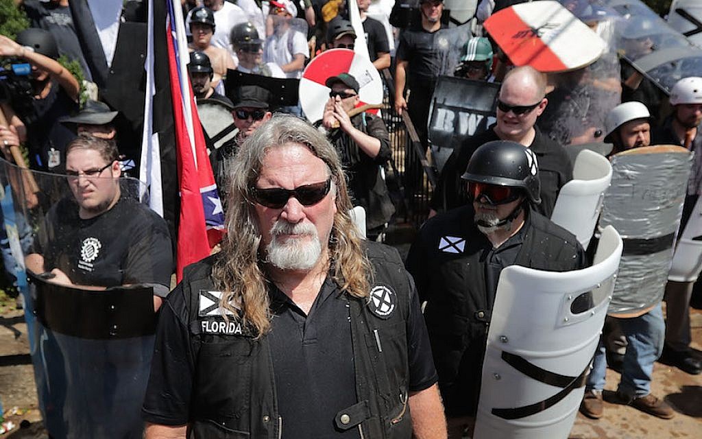 White supremacists exchange insults with counter-protesters as they attempt to guard the entrance to Emancipation Park in Charlottesville, Virginia, August 12, 2017. (Chip Somodevilla/Getty Images via JTA) White supremacists exchange insults with counter-protesters as they attempt to guard the entrance to Emancipation Park in Charlottesville, Virginia, August 12, 2017. (Chip Somodevilla/Getty Images via JTA)