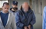 A suspect in a 1993 murder is brought for a hearing at the Magistrate's Court in Jerusalem on February 6, 2019 (Noam Revkin Fenton/Flash90)