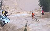 Man is rescued from floodwaters in the Arazim Valley, west of Jerusalem, February 28, 2019. (Channel 12 screen capture)