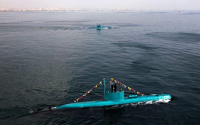 Iran's newly launched Ghadir submarines move in the southern port of Bandar Abbas in Persian Gulf, Iran, Wednesday, Nov. 28, 2012. Ghadir class submarines can fire missiles and torpedoes at the same time, and can operate in the Persian Gulf's shallow waters. (AP Photo/Fars News Agency, Ebrahim Norouzi)