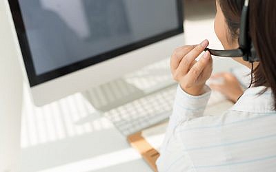 An illustrative image of a call center  (DragonImages; iStock by Getty Images)