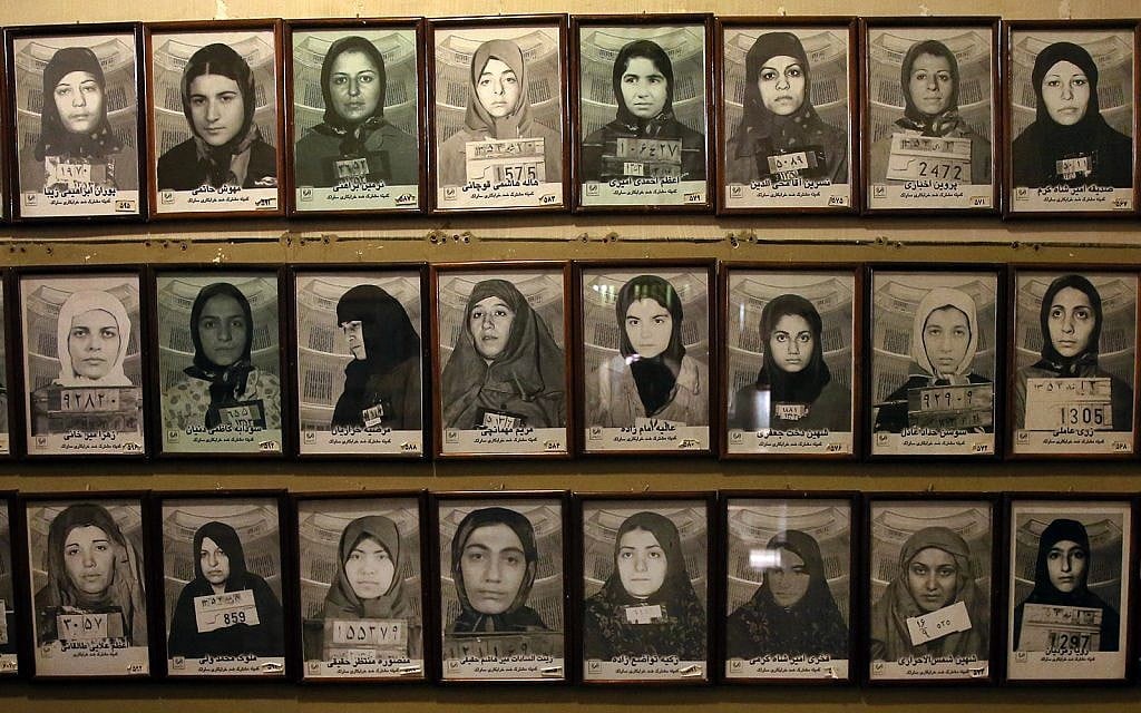 Mug shots of former prisoners hang on the wall at a former prison run by the pre-revolution intelligence service, Savak, now a museum, in downtown Tehran, Iran, January 7, 2019. (AP Photo/Ebrahim Noroozi)