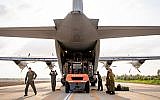 Illustrative: IDF and American troops unload a US Air Force cargo plane at an Israeli military base during the Juniper Falcon joint military exercise, February 2019. (US Army photo)