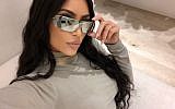 American reality television star Kim Kardashian modeling Israeli sunglasses. (Twitter)