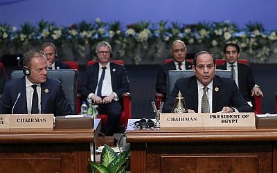 European Council President Donald Tusk, left, and Egypt's President Abdel-Fattah el-Sisi, right, attend a round table meeting at an EU-Arab summit at the Sharm El Sheikh convention center in Sharm El Sheikh, Egypt, February 24, 2019. (AP Photo/Francisco Seco)