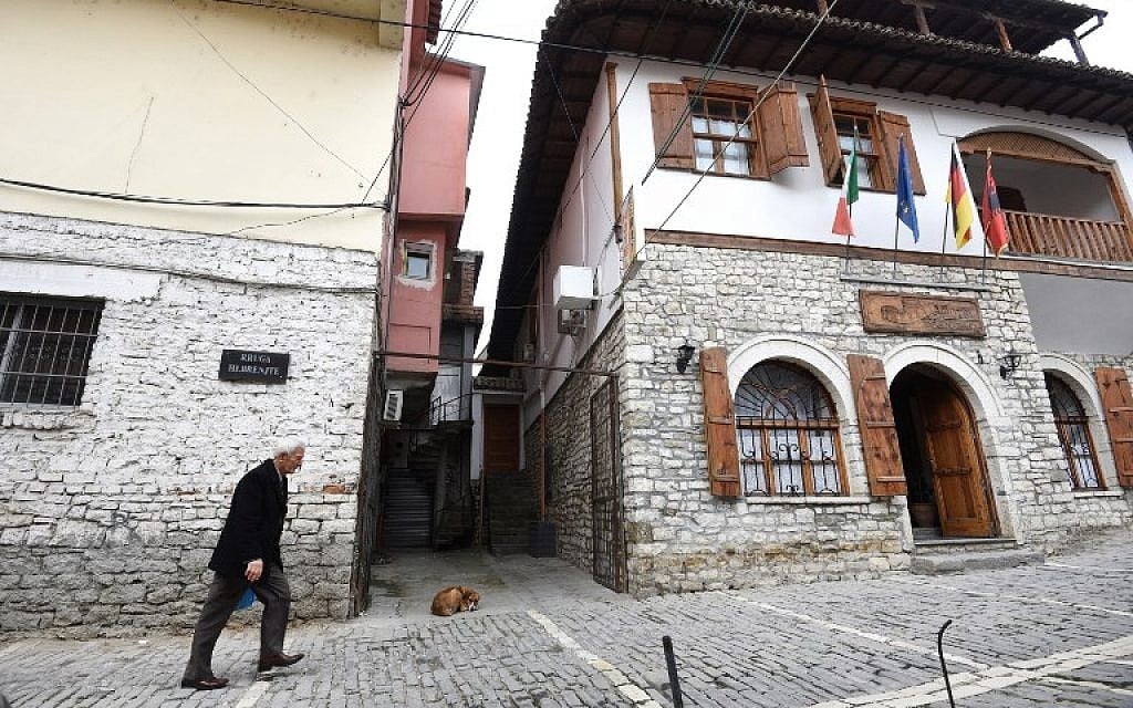 A man walks through Hebrew Street in the Albanian city of Berat on February 6, 2019. (Gent Shkullaku/AFP) A man walks through Hebrew Street in the Albanian city of Berat on February 6, 2019. (Gent Shkullaku/AFP)