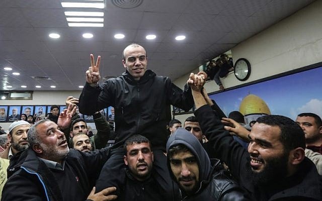 A Hamas member released by Egyptian authorities is greeted by supporters before meeting the terror group's leader Ismail Haniyeh in the Gaza Strip on February 28, 2019. (MAHMUD HAMS/AFP) A Hamas member released by Egyptian authorities is greeted by supporters before meeting the terror group's leader Ismail Haniyeh in the Gaza Strip on February 28, 2019. (MAHMUD HAMS/AFP)