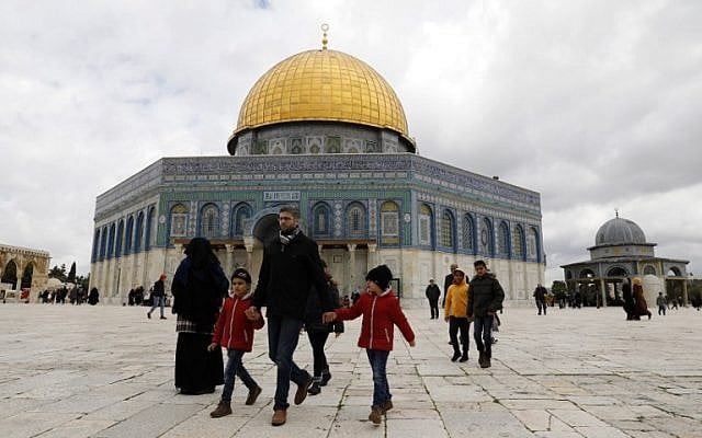 Palestinian Muslim worshipers walk past the Dome of the Rock mosque, situated in the al-Aqsa compound on the Temple Mount in Jerusalem's Old City, March 1, 2019, before Friday noon prayers. (Ahmad Gharabli/AFP) Palestinian Muslim worshipers walk past the Dome of the Rock mosque, situated in the al-Aqsa compound on the Temple Mount in Jerusalem's Old City, March 1, 2019, before Friday noon prayers. (Ahmad Gharabli/AFP)