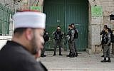 Border Police officers secure one of the entrances of the Temple Mount compound in the Old City of Jerusalem after closing the access to the site on March 12, 2019. (Ahmad Gharabli/AFP)