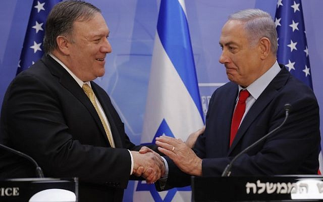 US Secretary of State Mike Pompeo (L) and Prime Minister Benjamin Netanyahu shake hands after delivering a joint statement during their meeting in Jerusalem on March 20, 2019/ (Jim Young/Pool/AFP) US Secretary of State Mike Pompeo (L) and Prime Minister Benjamin Netanyahu shake hands after delivering a joint statement during their meeting in Jerusalem on March 20, 2019/ (Jim Young/Pool/AFP)