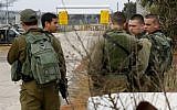 Israeli soldiers are seen at the Quneitra border crossing in the Golan Heights, on March 23, 2019, ahead of demonstrations over US President Donald Trump's recognition of Israeli sovereignty over the area. (Jack Guez/AFP)