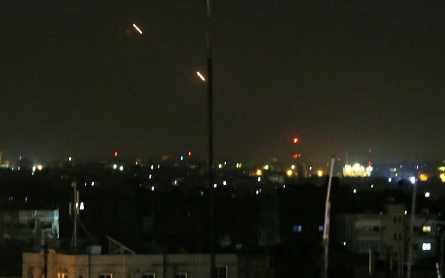 Illustrative: Rockets are fired from the Gaza Strip toward Israel on March 25, 2019. (Said Khatib/AFP) Illustrative: Rockets are fired from the Gaza Strip toward Israel on March 25, 2019. (Said Khatib/AFP)
