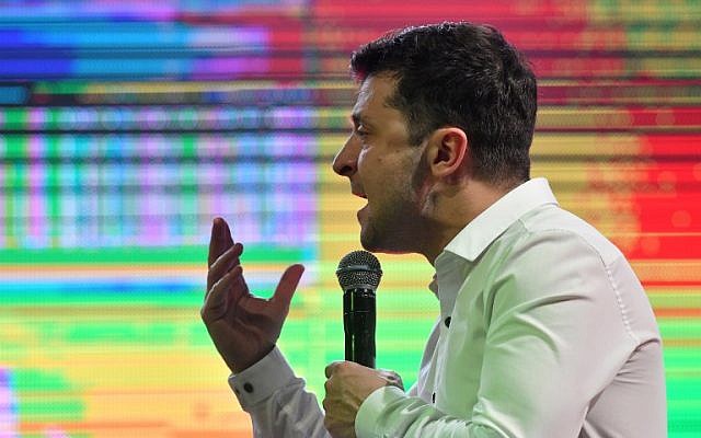 Ukrainian comic actor, showman and presidential candidate Volodymyr Zelensky speaks as he performs with his "95th block" comedy group in the small town Brovary, near Kiev, Ukraine, on March 29, 2019. (Genya Savilov/AFP) Ukrainian comic actor, showman and presidential candidate Volodymyr Zelensky speaks as he performs with his "95th block" comedy group in the small town Brovary, near Kiev, Ukraine, on March 29, 2019. (Genya Savilov/AFP)