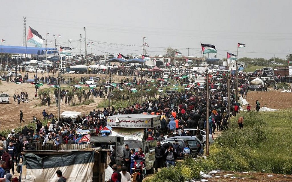 Palestinians gather near the border with Israel in Malaka east of Gaza City on March 30, 2019, as they mark the first anniversary of the 'March of Return' border protests. (Mahmud Hams/AFP)