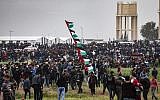 Palestinians gather near the border with Israel in Malaka east of Gaza City on March 30, 2019, on the first anniversary of Hamas-organized "March of Return" border protests. (Mahmud Hams/AFP)