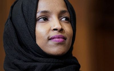 Democratic Representative Ilhan Omar of Minnesota listens as lawmakers speak about the Voting Rights Enhancement Act on Capitol Hill in Washington, DC, on February 26, 2019. (Joshua Roberts/Getty Images/AFP)