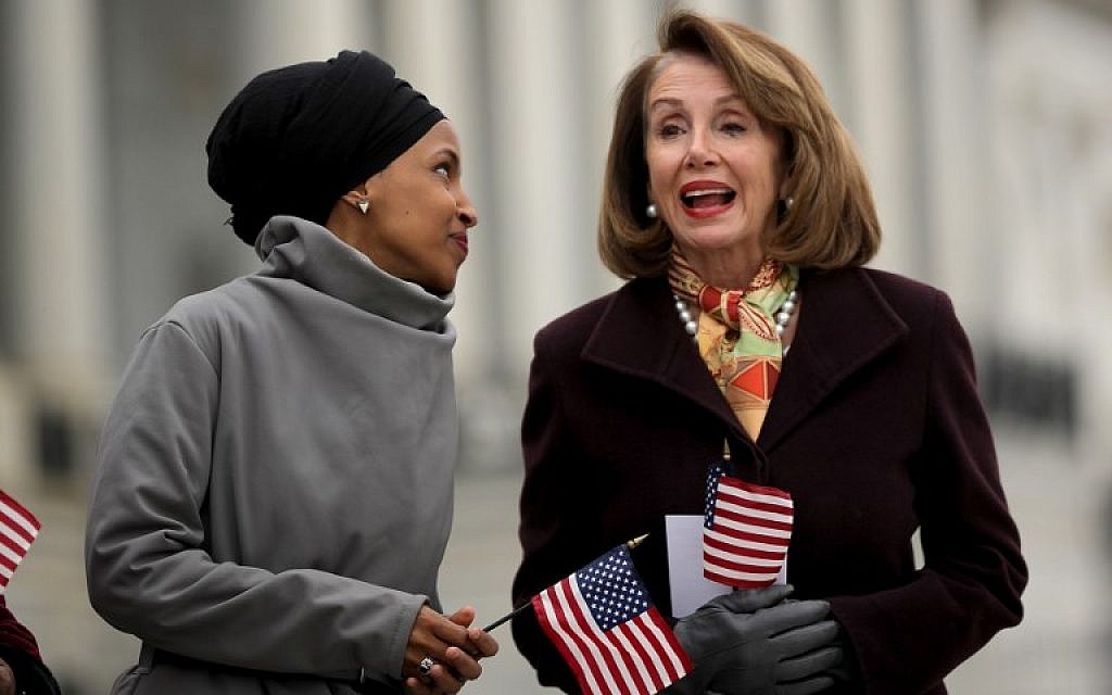 Representative Ilhan Omar of Minnesota talks with House Speaker Nancy Pelosi during a rally with fellow Democrats before voting on H.R. 1, or the People Act, on the East Steps of the US Capitol, March 8, 2019, in Washington. (Chip Somodevilla/Getty Images/AFP) Representative Ilhan Omar of Minnesota talks with House Speaker Nancy Pelosi during a rally with fellow Democrats before voting on H.R. 1, or the People Act, on the East Steps of the US Capitol, March 8, 2019, in Washington. (Chip Somodevilla/Getty Images/AFP)