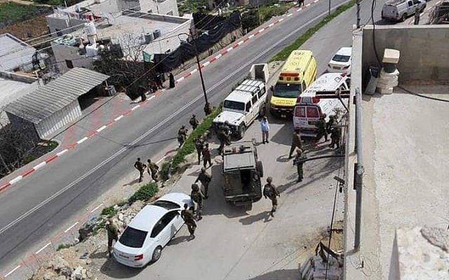 Israeli troops respond to a suspected attempted stabbing attack in the West Bank city of Hebron on March 12, 2019. (Yediot MeHaShetach) Israeli troops respond to a suspected attempted stabbing attack in the West Bank city of Hebron on March 12, 2019. (Yediot MeHaShetach)