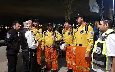 ZAKA Chairman Yehuda Meshi-Zahav (2L) gives the Israel team a final briefing before they depart for Ethiopia, March 10, 2018. (Courtesy)