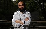 Elad Nehorai, a leader of a politically progressive Orthodox group, got his start by blogging openly about personal issues like addiction and his struggles with religion. (Courtesy of Nehorai/via JTA)