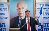 Labor Party leader Avi Gabbay leads a meeting at the Knesset in front of a poster of slain Prime Minister Yitzhak Rabin, November 20, 2017. (Yonatan Sindel/Flash90/via JTA)