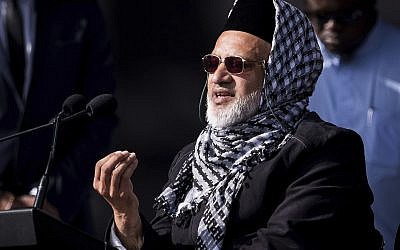 In this photo supplied by the New Zealand government, mosque shooting survivor Farid Ahmed addresses the national remembrance service in Hagley Park for the victims of the March 15 mosques terrorist attack in Christchurch, New Zealand, March 29, 2019. (Mark Tantrum/New Zealand Government via AP)