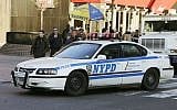A New York Police Department Chevrolet Impala squad car turns a corner Thursday, Feb. 9, 2006 in New York (AP Photo/Frank Franklin II)