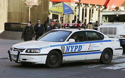 A New York Police Department Chevrolet Impala squad car turns a corner Thursday, Feb. 9, 2006 in New York (AP Photo/Frank Franklin II)