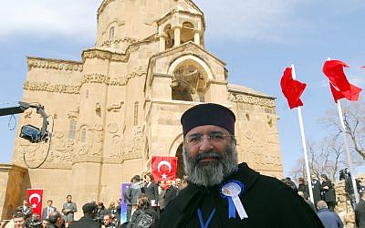 Patriarch Mesrob II, the spiritual leaders of Turkey's Armenian Orthodox community, looks toward cameras after a ceremony marking the restoration of the Akhtamar church, one of the most precious remnants of Armenian culture 1,000 years ago, in Lake Van in eastern Turkey, Thursday, March 29, 2007.  (AP Photo)