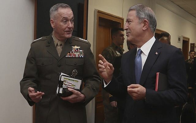 The US chairman of the Joint Chiefs of Staff, Gen. Joseph Dunford, left, and Turkey's Defence Minister Hulusi Akar speak during a meeting, in Ankara, Turkey, Tuesday, Jan. 8, 2019. (Turkish Defence Ministry via AP) The US chairman of the Joint Chiefs of Staff, Gen. Joseph Dunford, left, and Turkey's Defence Minister Hulusi Akar speak during a meeting, in Ankara, Turkey, Tuesday, Jan. 8, 2019. (Turkish Defence Ministry via AP)