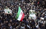 Mourners carry a flag-draped casket during a mass funeral in Isfahan, Iran, February 16, 2019, for 27 people killed in a suicide car bombing that targeted members of Iran's powerful Revolutionary Guard. (AP /Ebrahim Noroozi)