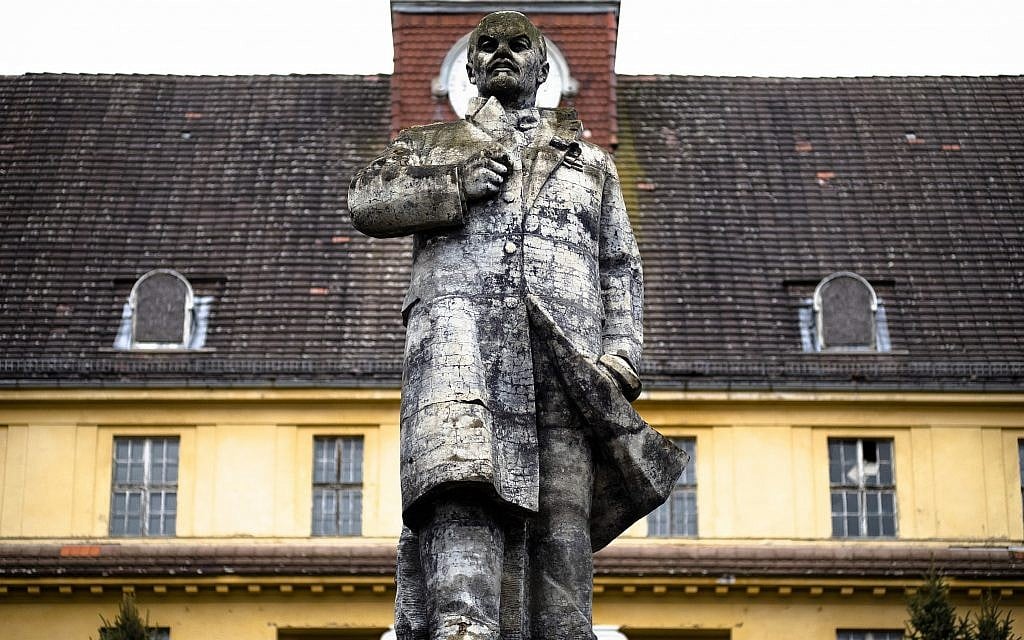 In this Tuesday, Feb. 22, 2019 photo, a Lenin monument stands in front of the abandoned "Haus der Offiziere", the headquarters for the Soviets' military high command in former East Germany, at the Wuensdorf neighborhood of Zossen, some 40 kilometers (25 miles) south of Berlin. (AP/Markus Schreiber)