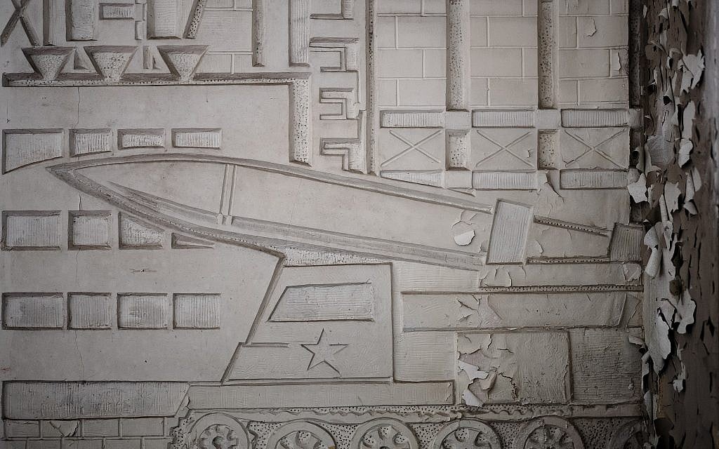 This Tuesday, Feb. 22, 2019 photo shows a wall relief inside the abandoned "Haus der Offiziere", the headquarters for the Soviets' military high command in former East Germany, at the Wuensdorf neighborhood of Zossen, some 40 kilometers (25 miles) south of Berlin. (AP/Markus Schreiber)