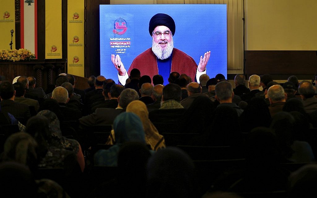 Supporters of the Iranian-backed Hezbollah terror group listen to a speech by Hezbollah leader Hassan Nasrallah via a video link in a southern suburb of Beirut, Lebanon, March 8, 2019. (AP Photo/Bilal Hussein) Supporters of the Iranian-backed Hezbollah terror group listen to a speech by Hezbollah leader Hassan Nasrallah via a video link in a southern suburb of Beirut, Lebanon, March 8, 2019. (AP Photo/Bilal Hussein)