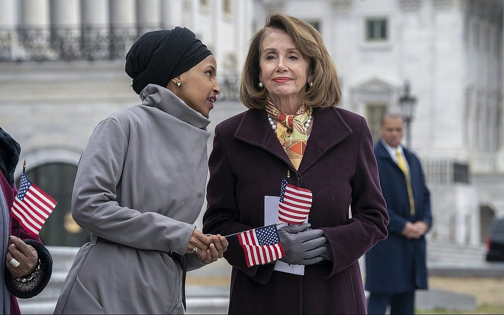 Rep. Ilhan Omar, Democrat of Minnesota, left, whispers to Speaker of the House Nancy Pelosi, Democrat of California, outside the Capitol in Washington, March 8, 2019. (AP /J. Scott Applewhite) Rep. Ilhan Omar, Democrat of Minnesota, left, whispers to Speaker of the House Nancy Pelosi, Democrat of California, outside the Capitol in Washington, March 8, 2019. (AP /J. Scott Applewhite)