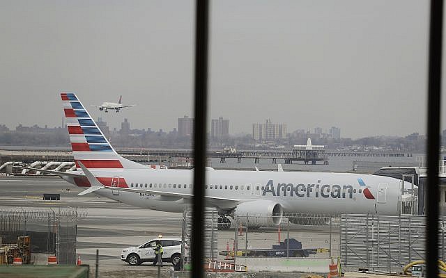 An American Airlines Boeing 737 MAX 8 sits at a boarding gate at LaGuardia Airport, March 13, 2019, in New York. (AP Photo/Frank Franklin II) An American Airlines Boeing 737 MAX 8 sits at a boarding gate at LaGuardia Airport, March 13, 2019, in New York. (AP Photo/Frank Franklin II)