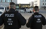 Illustrative: German police stand in front of a Dresden courthouse where a trial against a Syrian jihadist is set to begin, in Dresden, Germany, Monday, March 18, 2019. (Jens Meyer/AP)