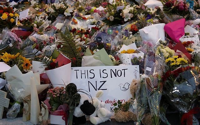 In this Saturday, March 16, 2019, file photo, flowers lay at a memorial near the Masjid Al Noor mosque for victims in last week's shooting in Christchurch, New Zealand. (AP Photo/Vincent Yu, File) In this Saturday, March 16, 2019, file photo, flowers lay at a memorial near the Masjid Al Noor mosque for victims in last week's shooting in Christchurch, New Zealand. (AP Photo/Vincent Yu, File)