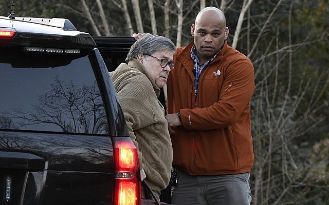 Attorney General William Barr arrives at his home in McLean, Va., on Saturday evening, March 23, 2019 (AP Photo/Sait Serkan Gurbuz)