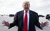President Donald Trump speaks to media before boarding Air Force One, Sunday, March 24, 2019, at Palm Beach International Airport, in West Palm Beach, Fla., en route to Washington. (AP/Carolyn Kaster)