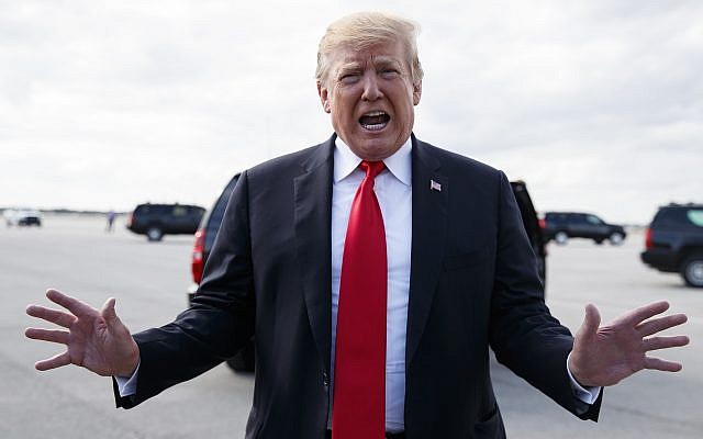President Donald Trump speaks to media before boarding Air Force One, Sunday, March 24, 2019, at Palm Beach International Airport, in West Palm Beach, Fla., en route to Washington. (AP/Carolyn Kaster) President Donald Trump speaks to media before boarding Air Force One, Sunday, March 24, 2019, at Palm Beach International Airport, in West Palm Beach, Fla., en route to Washington. (AP/Carolyn Kaster)