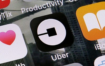 Illustrative - the Uber app on a phone in New York. (AP/Richard Drew, File)